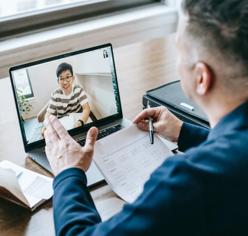 A man in a meeting via video chat